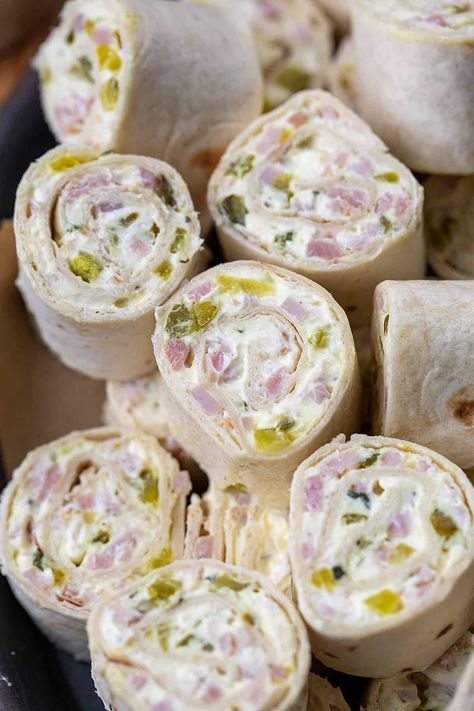 Ham and Pickle Pinwheels are flour tortillas filled and rolled with ranch-seasoned cream cheese, dill pickles, and ham, cut into bite-sized sections. They are a perfect appetizer to serve at your holiday parties and a delicious finger food anytime you crave a savory, tangy snack! Pickle Pinwheels, Rollups Appetizers, Pinwheel Appetizers Cream Cheese, Ham And Pickle, Ham Pinwheels, Pickle Roll Ups, Ham Roll Ups, Ham And Cheese Roll Ups, Turkey Rub