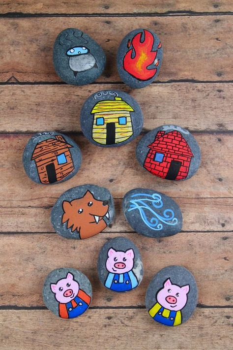 These 3 Little Pig story stones are perfect for re-telling and reading comprehension. Using flat rocks and paint pens, these are simple to make! 3 Little Pigs, Story Stones, Three Little Pigs, Rock Painting Designs, Stone Crafts, Rock Painting Art, Pebble Painting, Stone Work, Little Pigs