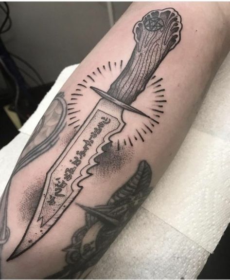 10 Best Supernatural Tattoos For Fans - Wondafox Supernatural Knife Tattoo, Super Natural Tattoo Ideas, Supernatural Show Tattoo, Supernatural Impala Tattoo, Tattoo Ideas Supernatural, Winchester Tattoo Ideas, Dean Winchester Tattoo Ideas, Super Natural Tattoo, Angel Blade Tattoo