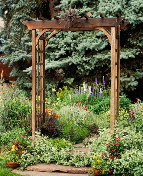 Whether standing alone or covered with climbing vines and flowers, these outdoor structures add a striking focal point to your yard. These arbor ideas will enhance your garden with charming appeal. #arborideas #pergolas #outdoorlandscaping #backyardideas #bhg Garden Arbor Ideas, Arbor Ideas, Wooden Arbor, Arbors Trellis, Side Yard Landscaping, Perennial Border, Garden Arbor, Climbing Vines, Perfect Plants