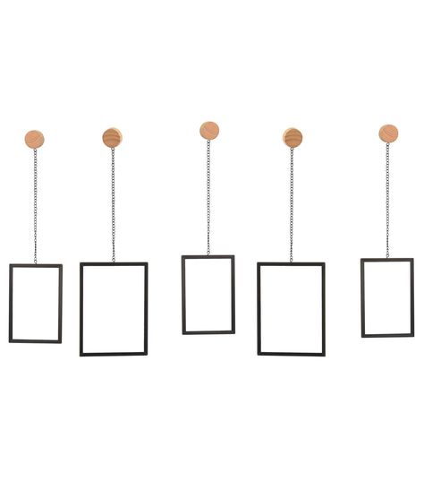 Complete your wall decor this season using the Gallery Style Hanging Metal Frame Set by Place & Time This set includes three gallery - style hanging metal frames in a black shade The frames are suspended from metal chains that are attached to a wooden knob You can add artwork or photos to these frames and showcase them on any wallBrand: Place & TimeIncludes five frames, five chains & five knobsDimensions: 5 x 7 inches & 4 x 6 inchesSize: 03 inch & 125 inches (Knob)Length: 85 inches (Chain)Conten Add Artwork, Frames For Pictures, Gallery Frame Set, Poster Frames, Wooden Knobs, Gallery Wall Frames, Display Cases, Wall Frames, Hanging Frames