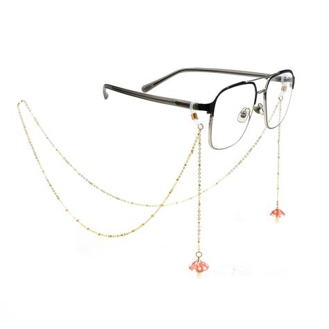 PRICES MAY VARY. Can be used as eyeglasses chain, mask chain or necklace. The side of the eyeglasses chain is uniquely decorated with mushroom shaped pendants. Both ends have adjustable metal coil retaining loops that fit most eyeglass frames and arms, and can be easily slid in and out to secure your glasses. 14K gold brass fittings, not easy to fade. Handmade and measures approximately 33 inches long. INCLUDES GIFT BOX: Each eyeglasses chain comes with 2 sets of silicone rings, packaged in a pi Glasses Frames For Women Brown Hair, Glasses Accessories Jewelry, Unique Glasses Frames Women, Fantasy Glasses, Eyeglass Necklace Holder, Glasses With Chain, Alt Closet, Mushroom Necklaces, Acrylic Mushroom