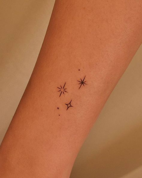 Minimalistic stars tattoo located on the wrist. 3 Stars Tattoo Wrist, 3 Tiny Stars Tattoo, North Star Minimalist Tattoo, Star Hands Tattoo, Star Micro Tattoo, Small Star Hand Tattoos, Small Tattoo Ideas Stars, Small Star Wrist Tattoos, Cute Star Tattoos For Women