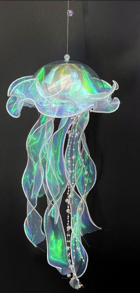 PRICES MAY VARY. 【Colorful Jellyfish Lamp】This jelly fish decoration lamp They glitter, sparkle and flow and add a pretty touch to any decorations.Great for Mer-Bash or Under the Sea Party 【Beautifully made】The jellyfish lanterns coloring was pretty the setup was easy. Button battery powered, and with a handle, you can let the jellyfish float anywhere in the house, or you can carry it out to light your way 【Durable and Unique】Lightweight Material, Weighing around 60g, this lamp is not on-ly dura Jellyfish Lantern, Diy Suspension, Fish Lanterns, Ocean Theme Birthday, Jellyfish Light, Colorful Jellyfish, Jellyfish Lamp, Fish Lamp, Haunted House Decorations