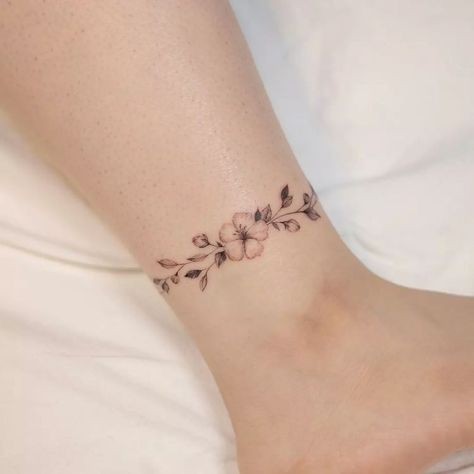 Daisy Chain Tattoo Ankle, Daisy Chain Tattoo, Anklet Tattoos For Women, Butterfly Ankle Tattoos, Ankle Band Tattoo, Wrap Around Wrist Tattoos, Finger Tattoos For Couples, Wrist Bracelet Tattoo, Chain Tattoo