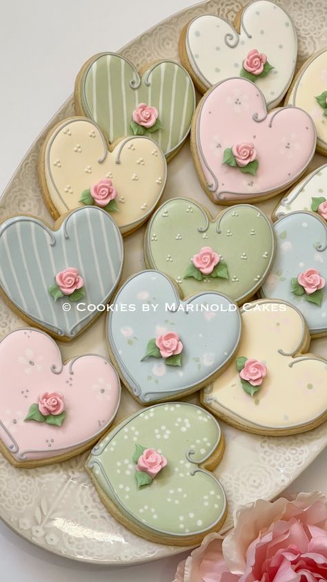 "A dozen of Shabby Chic themed Heart Cookies with Rosebud accent in the large size 3\". Design will have an assortment of patterns and colors, feminine, dainty, pretty chic. They will be individually wrapped in self-adhesive resealable cellophane. Since these cookies are handmade individually, please note that there will be some slight variations in color and size. Prepared and processed in a kitchen where allergens such as dairy, almonds, and other nuts or nut bi-products are used. If any of th Vintage Decorated Cookies, Future Mrs Cookies, Cottage Core Cookies, Rose Gold Cookies Decorated, Royal Icing Heart Cookies, Heart Royal Icing Cookies, Cute Sugar Cookies Designs, Coquette Cookies, Frosted Cookies Designs