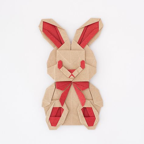 Rabbit v1 - Ribbon Variation, designed and folded by Michelle Fung (source: ) #origami #rabbit Origami Rabbit, Kraft Wrapping Paper, My Teddy Bear, Kraft Paper Wrapping, Vi Design, Origami Animals, Paper Animals, Miniature Diy, Model T