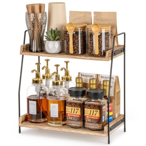 PRICES MAY VARY. PERFECT COFFEE BAR ORGANIZER: Elevate your coffee setup with our 2-tier carefully crafted coffee bar accessories organizer and storage. Perfect for neatly arranging all coffee essentials in one stylish space. Wooden shelves paired with iron racks seamlessly merge natural rustic and industrial style. Ideal for both casual coffee lovers and skilled baristas, providing a backdrop for your brewing creativity. SIMPLE ASSEMBLY AND STABLE STRUCTURE: No more complex setups or wobbly rac Wooden Kitchen Counter, Kitchen Counter Shelf, Condiment Storage, Coffee Bar Accessories, Counter Shelf, Coffee Organization, Coin Café, Coffee Area, Tea Station