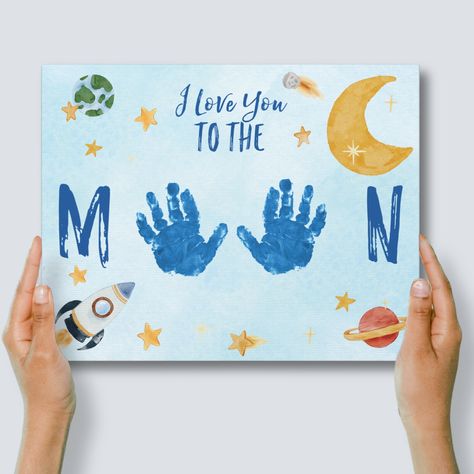 My BESTSELLING handprint craft, now beautifully printed for you on 11x14" canvas. A unique and creative way to cherish those little hands- which won't stay little for long! This "I Love You To The Moon" canvas with a whimsical, watercolor space scene will be shipped to you WITHOUT handprints on it so that your child can add 2 painted handprints directly onto the canvas. This way, you can personalize it yourself with original handprints from your child.  (See detailed crafting instructions below) Crafts To Make For Grandparents, Construction Handprint Art, Patriotic Handprint Art, Art Activities For One Year Olds, Kids Handprint Art For Dad, Dad Canvas From Kids, Toddler Hand Painting Ideas, Diy Crafts For Dads Birthday, Fathers Day Canvas Ideas For Kids