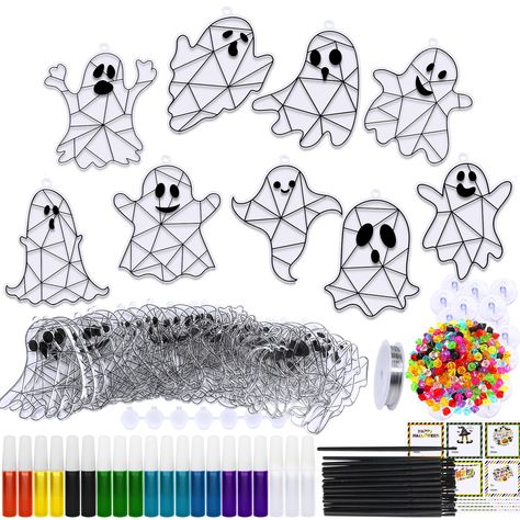 PRICES MAY VARY. Enhance kids' Halloween decorations with our 27 Halloween Ghost Suncatchers Craft Kit: This Halloween craft kit includes 27 Halloween ghost suncatchers in 9 designs (3 pieces per design), 20 bottles of 8 Halloween paint (6ml each), 1 strip of 8 empty paint pots, 27 paintbrushes, 324 Halloween beads, 1 roll of fishing thread, 27 hooks, 27 gift stickers. This Halloweeen ghost suncatchers paint kit is perfect for kids' Halloween crafts, fall activities, and holiday decorations. Col Diy Window Paint, Suncatchers Craft, Easy Halloween Crafts For Kids, Class Mom, Halloween Craft Kits, Window Paint, Classroom Halloween Party, Halloween Decorations For Kids, Crafts Fall