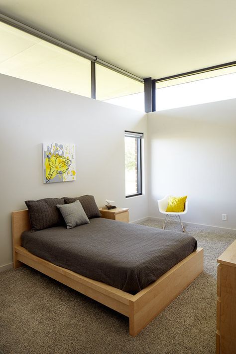 Modern bedroom in a Missouri prairie home High Level Windows, Bedroom Clerestory Windows, High Window Bedroom, Upper Windows In Bedroom, Clerestory Windows Bedroom, High Windows Bedroom, Simple Bed Ideas, Modern Bedroom Windows, Room Window Ideas