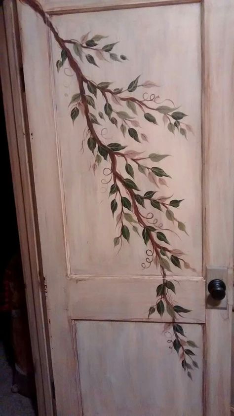 This is a Painted Door for a bedroom.  It was given an antique finish after painting.   A branch with multiple colors of leaves. Cottagecore Door Decor, Cool Bedroom Door Ideas, Aesthetic Bedroom Door Ideas, Door Paint Design Ideas, Paint Bathroom Door Ideas, Fun Door Painting Ideas, Drawing Door Ideas, Door Frame Art, Painting Closet Doors Ideas