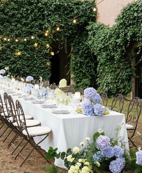 We love the idea of long table weddings - everyone seated equally together to mingle and enjoy the night. How beautiful is this long table lined with hydrangeas?! By Pop Up Planning Co for an Italian Elopement. Yellow Tablescape, Blue Hydrangea Centerpieces, Long Table Centerpieces, Italian Elopement, Family Style Weddings, Blue Hydrangea Wedding, Long Table Wedding, Blue Wedding Centerpieces, Baby Blue Weddings