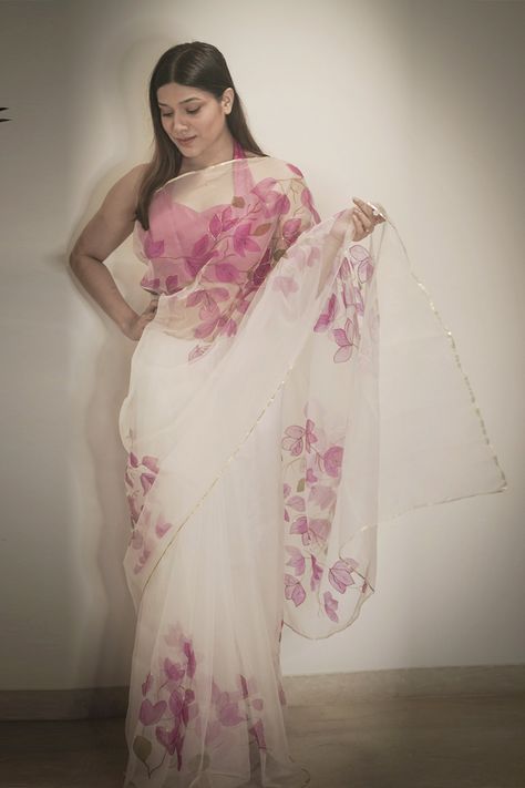 White sheer organza saree with multi-color hand painted floral motifs and gota worked border. Components:1 Hand Painted, Embroidered Fabric:Swiss Organza Color:White  Note: Blouse worn by the model is not for sale - Aza Fashions Organza Hand Painted Saree, Hand Painted Organza, Hand Painted Saree, Saree White, Painted Saree, Saree Painting, Wedding Saree Blouse, Saree Floral, Floral Saree