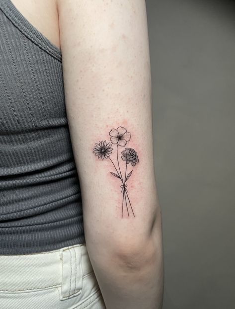 #tattoo #tattooideas #aesthetic #minimalist left flower: aster middle flower: marigold right flower: carnation Honeysuckle Tattoo, Flower Marigold, Flower Carnation, Carnation Tattoo, Black And White Tiles Bathroom, Small Flower Tattoos, Birth Flower Tattoos, Tiles Bathroom, Flowers Tattoo