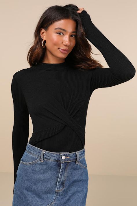 We always love to add a little extra ""oomph"" to our looks, so we adore the updated vibes of the Lulus Twist Time Black Ribbed Twisted Mock Neck Long Sleeve Bodysuit! Stretchy textured ribbed knit shapes this chic bodysuit that has a mock neckline, atop a flattering bodice with a unique twisted detail at the front. Long sleeves frame the figure-fitting silhouette that ends at attached thong bottoms with snap closures. Keyhole cutout at back has top button closures. Fit: This garment fits true to size. Length: Size medium measures 28.5" from shoulder to hem. Bust: Great for any cup size. Waist: Fitted - stretchy fabric allows custom fit. Hip: Fitted - stretchy fabric allows room for hips. Undergarments: May be worn with any standard bra. Fabric: Fabric is very stretchy. Unlined. 77% Polyes Mock Neck Long Sleeve, Black Long Sleeve Shirt, Mock Neckline, Womens Long Sleeve Shirts, Black Rib, Cup Size, Long Sleeve Bodysuit, Stretchy Fabric, Black Long Sleeve