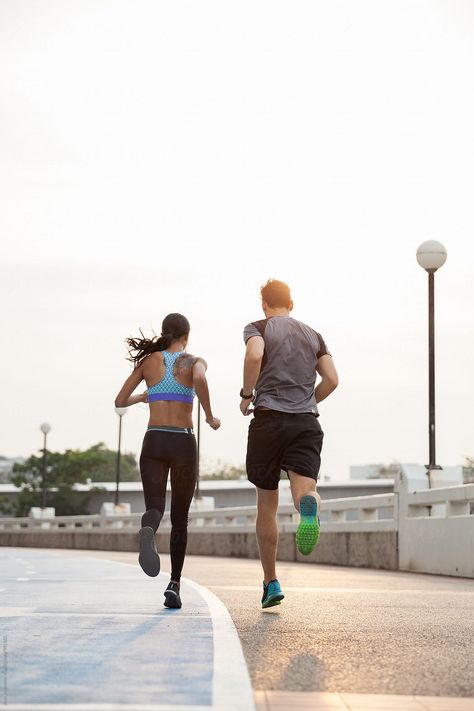 Young Couple Running Together | Stocksy United Running Together Aesthetic, Couple Running Together, Together Aesthetic, Running Together, Running Pose, Running Pictures, Mediterranean Ritual, Running Photos, Iv Infusion