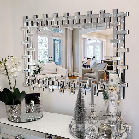 PRICES MAY VARY. Elegant Decorative Wall Mirror: This mirror has a shimmering glass frame that reflects different images when light shines on it. Modern Design: The glass surface of the mirror creates a contemporary and spacious look. Large Size: The mirror measures 36 inches by 24 inches, making it a great addition to any room. Sturdy Hooks: The mirror is mounted with 4 reinforced D-Ring hooks that can support it both vertically and horizontally. Protective Packaging: The mirror is carefully pa Living Room Mirror Wall Decor, Glam Entryway Decor, Living Room Mirror Wall, Dining Room Mirror Wall, Mirror Wall Tiles, Wall Mirror Decor Living Room, Mirror For Entryway, Silver Wall Decor, Mirror Decor Living Room