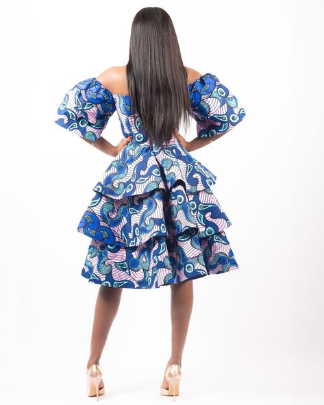 We just can’t get enough of this dress. Perfect for all types of occasions where you need to make a statement. Great for any wedding guest if you ask us😉 Enjoy 15% off when you subscribe to our newsletter! #africanprintsinfashion #africanfashion #ankarafashion #rmlooks Midi Dress Layering, Midi Design, Layered Sleeves, Xxxl Dress, Dress Layered, Wax Fabric, Infinity Dress, African Print Dress, Ankara Dress