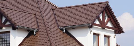 This ceramic roof tile pattern adds fun and unique details to this roof  that you can't achieve with asphalt shingles. #whytile Flat Roof Tiles, Metal Roof Tiles, Ceramic Roof Tiles, Tile Paint, Brown Tile, Clay Roofs, Solar Roof Tiles, Eclectic Bathroom, Roofing Company