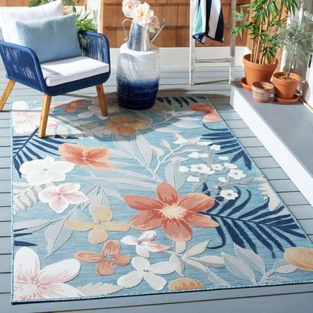 This Safavieh rug features unique beauty. Our rugs are produced and styled with engaging patterns in harmonious hues that convey a warm, welcoming aspect in room decor. From coveted fresh and trendy designs to timeless heirloom-quality pieces, expressing your unique personal style has never been easier. Size: 6'-5" x 6'-5" round.  Color: Blue. Patio Cabana, Tropical Area Rugs, Deck Porch, Geometric Motifs, Weather Wear, Patio Rugs, Transitional Rugs, Beachcrest Home, Outdoor Area Rug