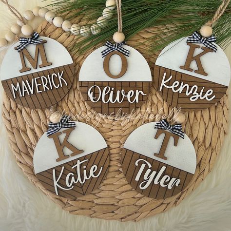 Super cute round wooden Christmas ornaments personalized with your name, and shiplap design of choice. These ornaments make the perfect Christmas gift for your entire family! -5 different shiplap engraving designs to choose from -5 different fonts to choose from Dimensions:  - 3.75" x 3.75" Wooden, laser cut & engraved, stained and painted. No returns or refunds on custom orders, please ensure your spelling is correct when ordering. Yearly Christmas Ornaments, Round Wood Name Signs, Beginner Laser Engraving, Christmas Custom Ornaments, Cnc Projects Ideas Christmas Gifts, Christmas Tree Family Ornaments, Easy Wooden Ornaments, Cricut Christmas Ornaments Wooden, Cut Wood Ornaments With Cricut