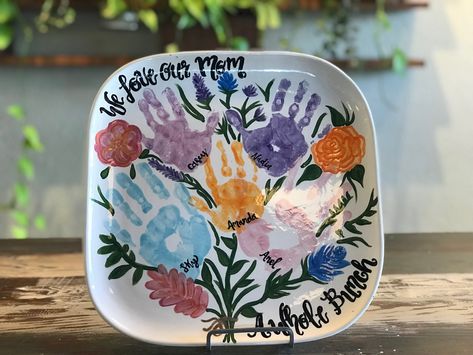 Choose your pottery and paints from a selection online and create this beautiful handprint bouquet! Handprint Plate For Grandma, Grandma Plate Diy, Handprint Plate Ideas, Handprint Ceramic Ideas, Hand Print Plate Ideas, Hand Print Pottery, Toddler Pottery Painting Ideas, Hand Print Pottery Ideas, Mother’s Day Pottery Ideas