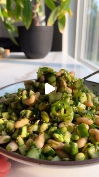 Vegan Food Recipes on Instagram: "🫚Ginger Shallot Chopped Bean Salad

By @plantbasedrd 

Recipe:

Ingredients:

1 1/2 cups frozen edamame, thawed
1, 15 oz can cannellini beans, drained and rinsed
3 Persian cucumbers, diced
1 jalapeño, thinly sliced (deseed to make less spicy)
2 scallions, thinly sliced
1/3 cup cilantro leaves, minced
1 tbsp toasted sesame seeds (optional)
1 avocado, diced

Ginger Shallot Vinaigrette
1 small shallot, finely minced (about 3 tbsp)
1 tbsp fresh ginger, grated
1 clove garlic, grated
Juice and zest of 1 lemon
1 tsp rice vinegar
1 tsp dijon mustard
1 tbsp maple syrup
3 tbsp extra virgin olive oil
Kosher salt
For serving: Butter lettuce, cooked white rice/quinoa

Find full recipe at the @plantbasedrd profile

#vegan #veganfood #vegansofig #veganfoodshare #veganl Wraps With Rice, Rice And Avocado, Frozen Edamame, Shallot Vinaigrette, Mediterranean Diet Recipes Dinners, Butter Lettuce, Mediterranean Diet Plan, Persian Cucumber, Cooking White Rice