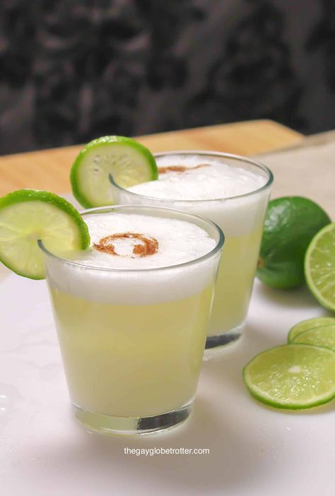 Peruvian Pisco Sour Recipe Pomegranate Drinks Cocktails, Pisco Sour Recipe, Lime Simple Syrup, Popular Drink Recipes, Sour Foods, Party Cocktails, Classic Cocktail Recipes, Pisco Sour, Popular Drinks