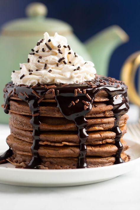 For a cozy morning or indulgent brunch, our hot chocolate pancakes are sure to delight. Made with Swiss Miss® Non-Dairy Hot Cocoa Mix and topped with chocolate syrup and Reddi-wip®, our hot chocolate pancake recipe makes any breakfast a treat! Hot Chocolate Pancakes, Ready Set Eat, Swiss Miss, Chocolate Pancakes, Coconut Custard, Custard Filling, Hot Cocoa Mixes, Chocolate Caliente, Melting Chocolate Chips