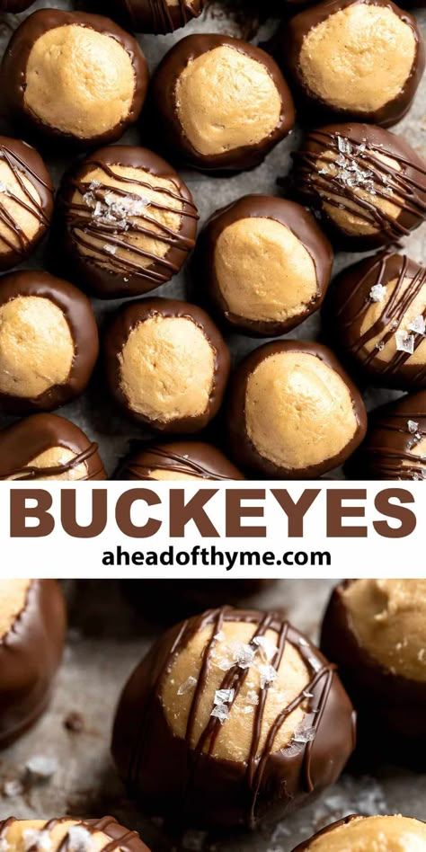 These peanut butter Buckeyes are a classic holiday dessert that's more like a truffle than a cookie, although they're a must-have on many Christmas cookie trays. They're soft and tender with a creamy burst of peanut butter enrobed in a crunchy chocolate shell. You won't be able to eat just one! These no bake treats are made by making sweet peanut butter balls dipped in dark chocolate. They're perfect for any holiday table (and they last forever in the fridge)! | aheadofthyme. via @aheadofthyme Peanut Butter Holiday Treats, Thanksgiving Truffle Desserts, Christmas Treat Box Ideas, Holiday Treat Boxes, Fall Truffles, Truffle Dessert, Classic Christmas Recipes, Classic Christmas Treats, Holiday Truffles