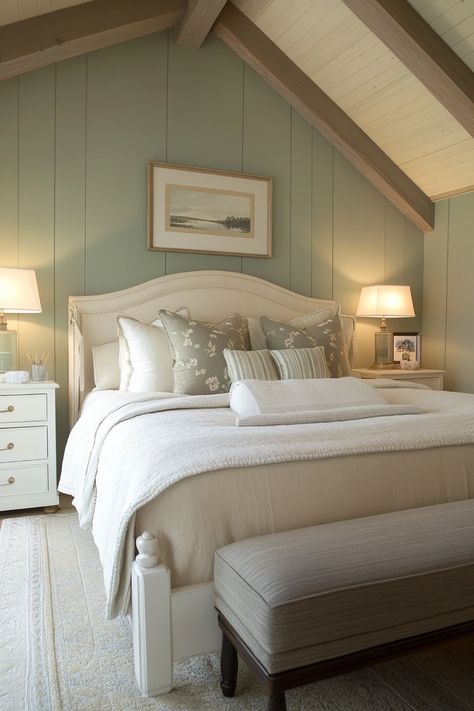 Cozy bedroom with a vaulted ceiling, beige tones, a bed with decorative pillows, and two nightstands with lamps. Primary Bedroom Paint Ideas, Calming Bedroom Colors Master Suite, Bedroom Calming Colors, Bedroom Inspirations Cozy Color Schemes, Relaxing Bedroom Ideas Calming Colors, Bedroom Color Combinations Ideas, Cozy Bedroom Color Schemes, Sea Salt Bedroom, Soothing Bedroom Paint Colors