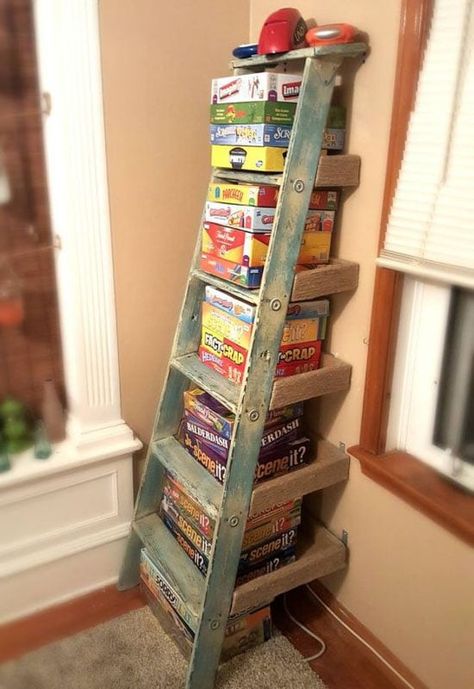 Repurposed Ladder Shelf, Interior Design Country, Repurposed Ladders, Ladder Shelf Diy, Hangout Room, Board Game Storage, Old Ladder, Game Room Family, Youth Room