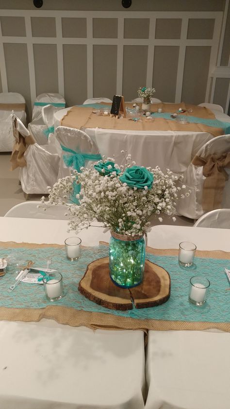 Teal And Camo Wedding Ideas, Teal Western Party Decorations, Bridal Shower Teal Theme, Aqua Blue Wedding Decorations, Aquamarine Quinceanera Decorations, Teal And Grey Wedding Centerpieces, Country Mason Jar Centerpieces, Teal Wedding Centerpieces Diy, Teal Table Centerpieces