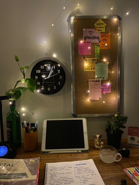 A cute study table setup with aesthetic lights and decor Fairy Lights Study Table, Desk Pinboard, Fairy Lights Desk, Ig Grid, Desk Organization Ideas, Little Desk, Post Cover, Study Decor, Light Study