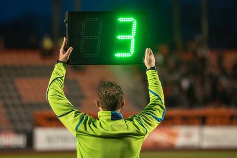 Technical referee shows 3 minutes added time during the football match. Football Referee, Football Match, Football, American Football