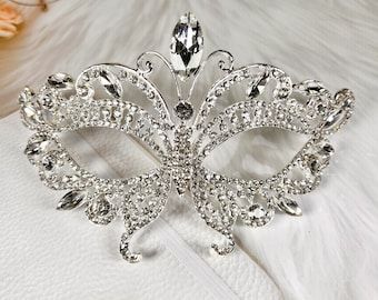 #GlamUp #EtsySale #MasqueradeElegance #JewelryLove 
#StyleUnmasked #EtsyFinds #MasqueradeBall #ElegantEarrings #RoyalTiaras #ShopNow #EtsyShop #MasqueradeBall #MardiGras #VenetianMas #EtsySellers #BridalTiara #PromQueen #PrincessTiara #Handmade #BridalJewelry #BirthstoneJewelry #StatementEarrings Butterfly Masquerade Mask, Butterfly Masquerade, Costume Masquerade, Masquerade Wedding, Carnival Themed Party, Happy Jewelry, Royal Crowns, Dazzling Earrings, Venetian Masquerade