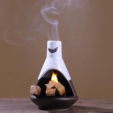 PRICES MAY VARY. ELEGANT DESIGN: The Chimney Sage Holder boasts a beautiful white and deep brown color combination, accentuated by a moon-shaped pattern on the top, adding a touch of elegance to any space. FUNCTIONAL USE: Perfect for holding and burning sage and palo santo, and the chimney palo santo holder is designed to collect the ash for easy cleanup after each use. DURABLE CERAMIC MATERIAL: Crafted from high-quality ceramic, this sage holder is built to last, ensuring long-lasting use and d Burning Palo Santo, Sage Holder, Sage And Palo Santo, Palo Santo Sticks, Pottery Projects, Burning Sage, Meditation Altar, Incense Holders, Deep Brown