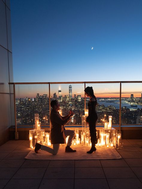 New York City proposal ideas by Marcy Blum Proposal Set Up Ideas Rooftop, Rich Proposal Aesthetic, Proposal At Night With Lights, Rooftop Proposal Night, City View Proposal, City Lights Proposal, At Home Engagement Ideas, Proposal In New York, Marry Me Lights Proposal