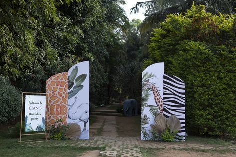 Experience the adventure as you walk through our captivating jungle-themed entrance arch for the ultimate birthday celebration! 🐾 Safari Vibes: Embrace the untamed spirit with lush greenery, exotic creatures, and jungle-inspired decor. 🌴 A Wild Welcome: Our entrance arch sets the tone for an unforgettable journey through the wild. It's a celebration that promises to be a roaring good time! #JungleBirthday #WildCelebration #EntranceDecor #PartyInStyle" Safari Entrance Decor, Jungle Theme Event, Birthday Entrance, Jungle Theme Decorations, Entrance Arch, Event Booth Design, Party Entrance, Event Booth, Jungle Birthday