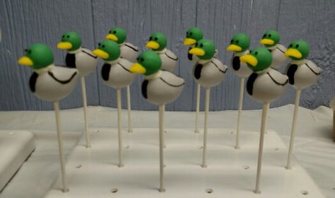 Mallard duck cake pops Mallard Duck Party Ideas, Hunting Cake Pops, Mallard Duck Smash Cake, One Lucky Duck Birthday Party Mallard, Mallard Cake, Mallard Duck Birthday Party, Mallard Duck Cake, Duck Cake Pops, Mallard Duck Baby Shower Ideas