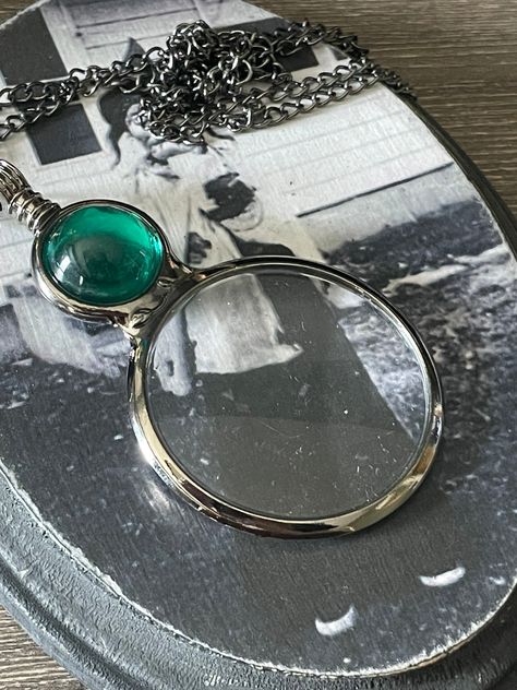 Magnifying Glass Pendant Size: 20 Inches Quantity: One necklace Gravity Falls Journal, Magnifying Glass Necklace, Baby Gate, Blue Springs, Magnifying Glass, Glass Necklace, Glass Pendant, Pendant Necklaces, Size 20