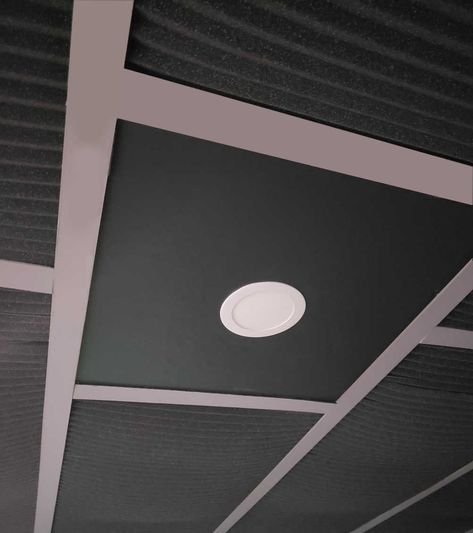 Easy way to makeover an existing drop ceiling. Customize by widening the grid and using acoustic foam for tiles. Update lighting with LED recessed lights. Drop Ceiling Tiles Diy, Diy Drop Ceiling, Black Drop Ceiling, Ceiling Tiles Diy, Drop Ceiling Makeover, Suspended Ceiling Panel, Drop Ceiling Basement, Drop Ceiling Panels, Ceiling Makeover