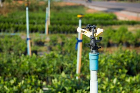 Photo sprinkler irrigation system close ... | Premium Photo #Freepik #photo Sprinkler System Installation, Lawn Irrigation, Sprinkler Irrigation, Green Valley, Garden Irrigation System, Sprinkler System, Garden Irrigation, Irrigation System, Lawn And Garden