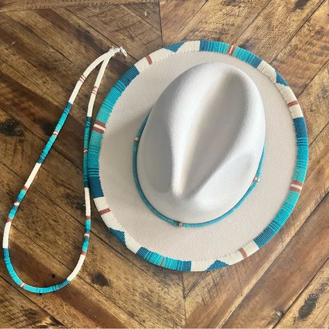 This Beautiful Cream And Turquoise Fedora Hat, Is A Showstopper For Sure. This Beautiful Hat Will Come With A Matching Necklace Also. Material: 65% Cotton, 35% Polyester With Adjustable Strap Inside; Hat Circumference: M 56-58cm/22"-22.8", L 58-60cm/22.8"-23.6"; Brim Width: M 7cm/2.75", L 8cm/3.14"; Height: M 12cm/4.72, L 13cm/5.12" Breathable, Lightweight And Comfortable For All-Day Wear. All Hand Beaded With Over 2,000 Beads. Classic Design With Belt Will Make You So Fashion, Elegant And Charm Beaded Fedora Hats, Hats With Beads, Beaded Hat Designs, Hat Brim Beading Pattern, Beaded Hat Patterns, Hat Beading, Native American Beaded Hat Brim, Beaded Fedora Hat, Beaded Brim Hat