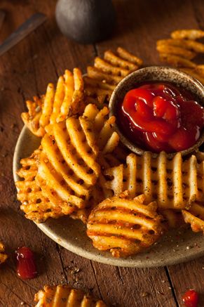 Happy Fry-Day!: 6 Homemade French Fry Recipes - Paula Deen Homemade Crispy Fries, Waffle Fries Recipe, Fried Fries, Organic Ketchup, Copycat Chick Fil A, Crispy Fries, Paula Deen Recipes, Waffle Fries, Potato Snacks