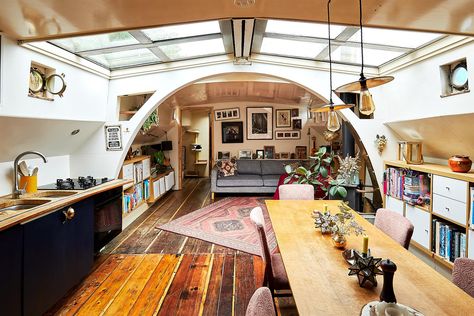 A characterful Dutch Barge in a perfect west-facing spot on the river, on a residential mooring south-west of Kew Bridge. This charming, well-maintained boat is accessed through the wheelhouse with 360-degree views. An array of original features include the wheel, anchor and windlass, and beautiful original hardwood floors throughout. The separate, self-contained and generous captain’s cabin has copious storage, heating and its own toilet: ideal for guests, or even a lodger. The main ... Tiny Houseboat, Barge Interior, Canal Boat Interior, Barge Boat, Boat Interior Design, Boat House Interior, Houseboat Living, Dutch Barge, Narrow Boat