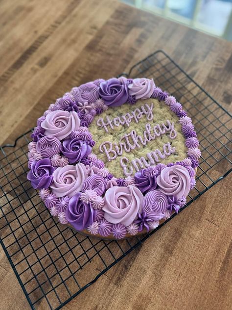 Mother’s Day Heart Cookie Cake, Purple Cookie Cake, Decorated Cookie Cake Birthday, Cookie Cake Ideas Decorated, 83 Birthday Cake, Flower Cookie Cake, Cookie Cake Decorating Ideas Birthdays, Birthday Cookie Cake Designs, Purple Cookies