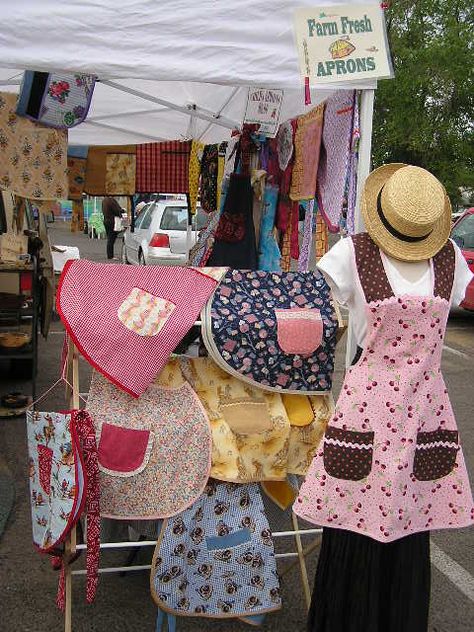 part of my apron display for Farmers Market Apron Display Ideas Craft Fairs, How To Display Aprons At A Craft Show, Farmers Market Sewing Ideas, Displaying Aprons, Apron Display, Quilt Shop Displays, Booth Display Ideas Diy, Farmers Market Booth, Farmers Market Display