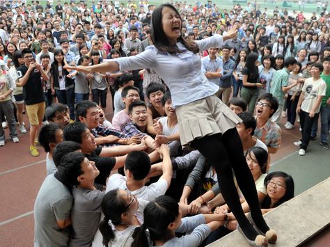 It's not all work. Leading up to the exam, students and teachers take part in pressure-release activities, like this trust-fall. Trust Fall, Maybe Someday, School Photography, Youth Group, Autumn Activities, Pose Reference Photo, Group Photos, Photography Inspo, Historical Photos